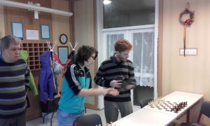 Terbe,J(left) giving a hand