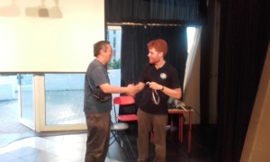 Yip(Left) getting medal for doing something