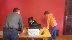 Edina(centre) doing some work